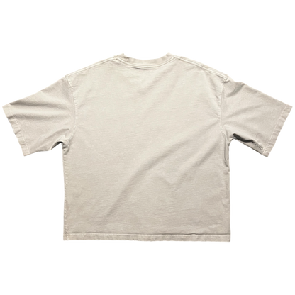 A light beige crewneck t-shirt shown from the back, laid flat against a solid white background.