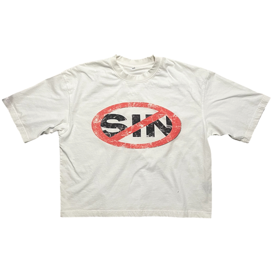 A white short-sleeve t-shirt with a distressed graphic on the chest showing the word 'SIN' in black inside a red prohibition symbol.